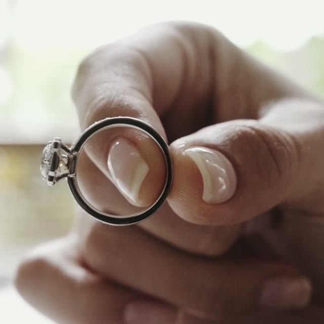 A finished ring being handed over